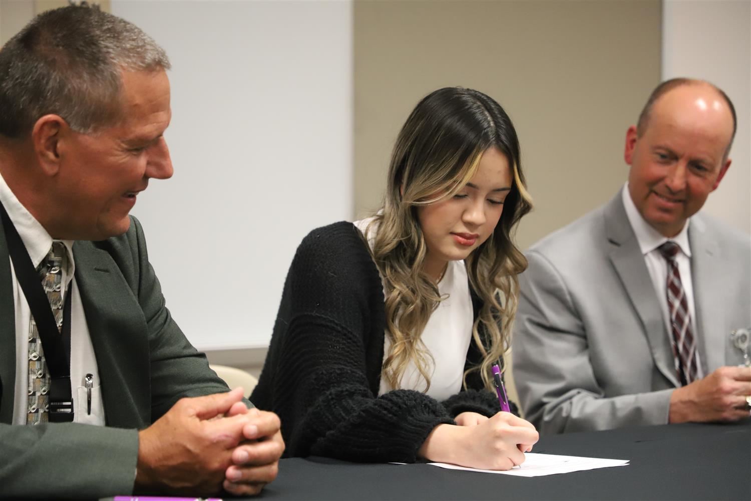 Michelle Fuentes signs Pathback agreement alongside Matt Fisher and Hank McFarland